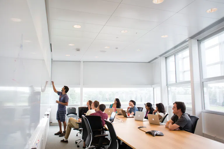 Students gathered in a seminar room.