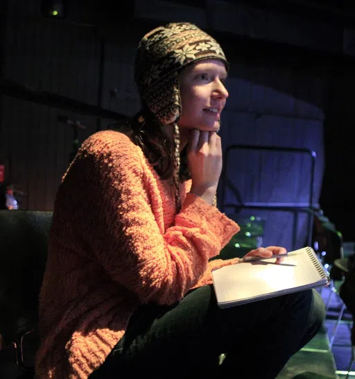 Student sitting with a notebook 