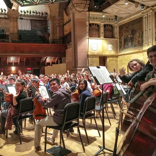 Orchestra members on stage