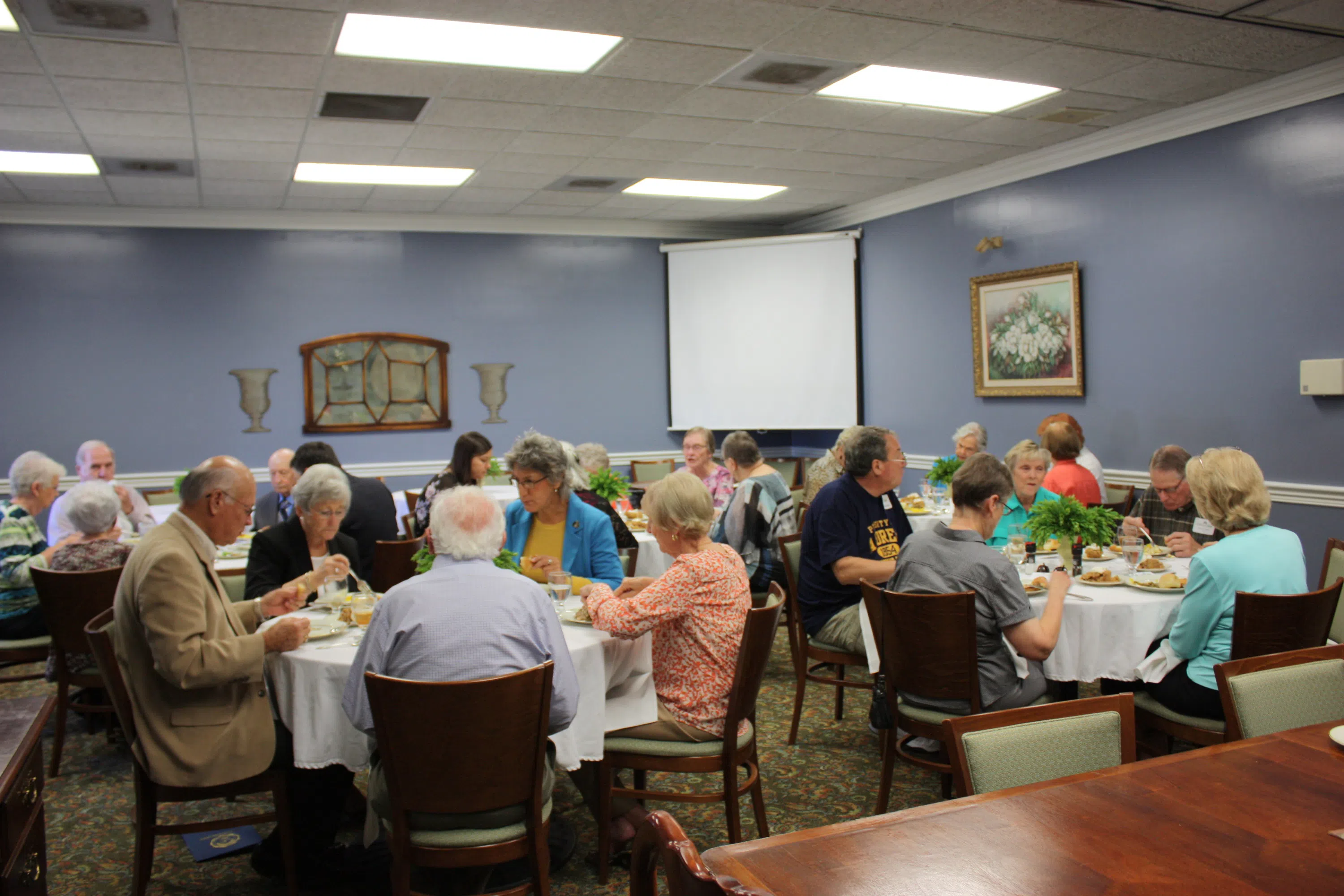 Photo of guests eating in the private dining room located in Turner Dining Hall.  