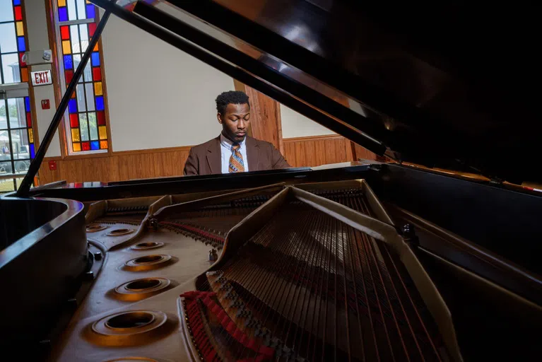 Photos of male playing the Steinway piano located in Jones Chapel and additional black and white image of the piano keys.