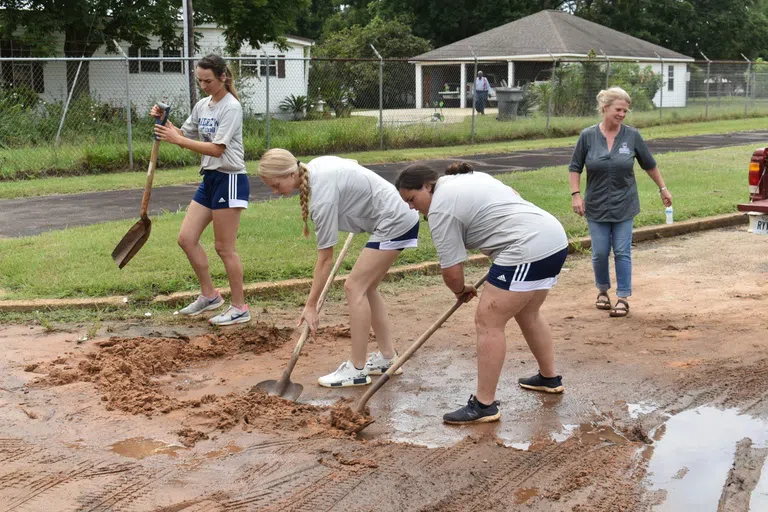 Andrew College volunteers working within the community.