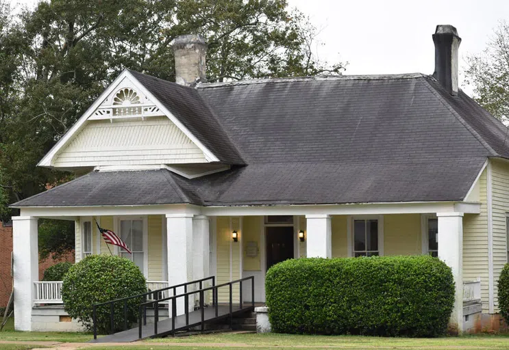 Image of the AndrewServes House during the daytime.  