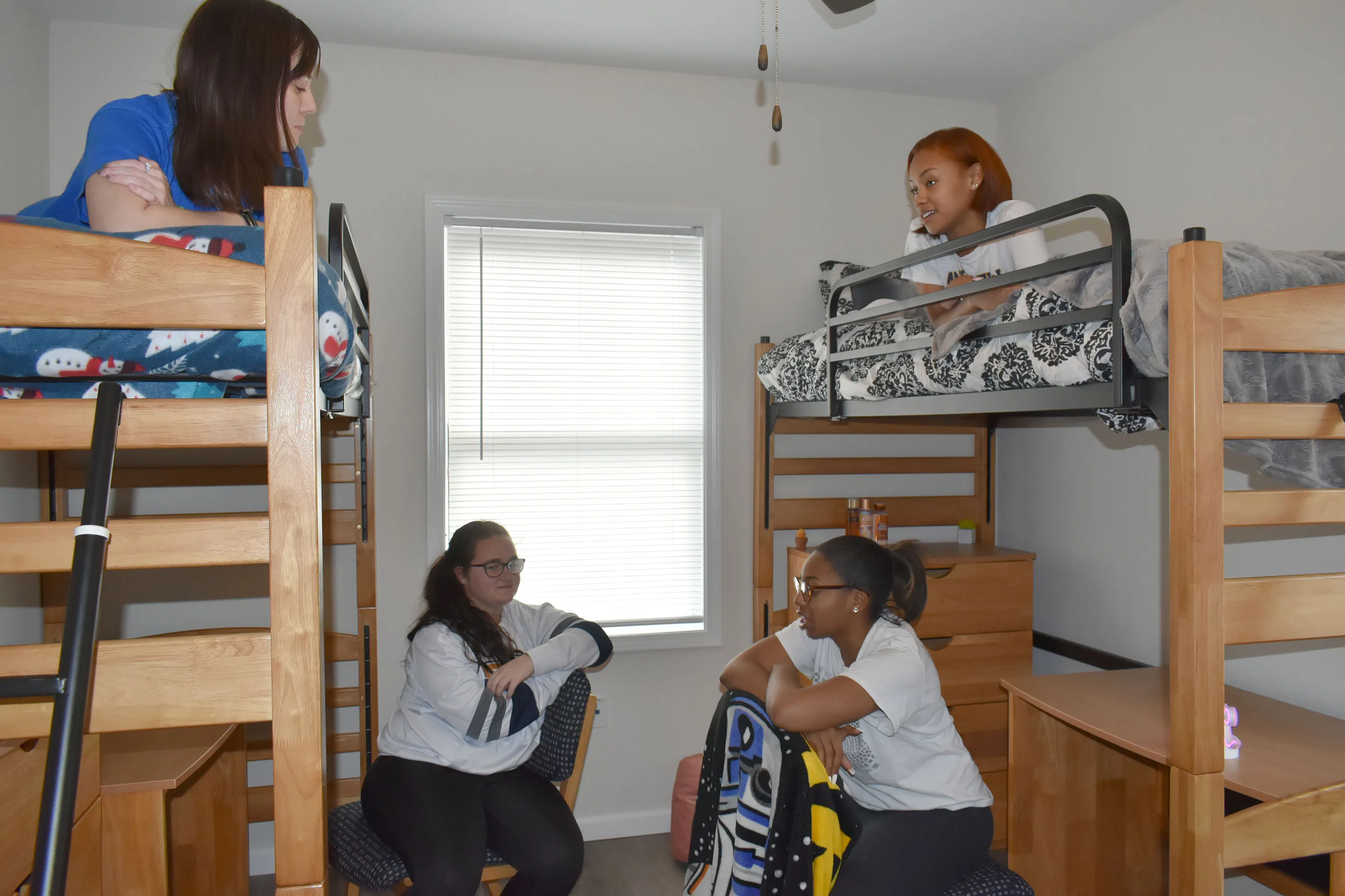 Patterson bedroom with bunk, desk, and chair.