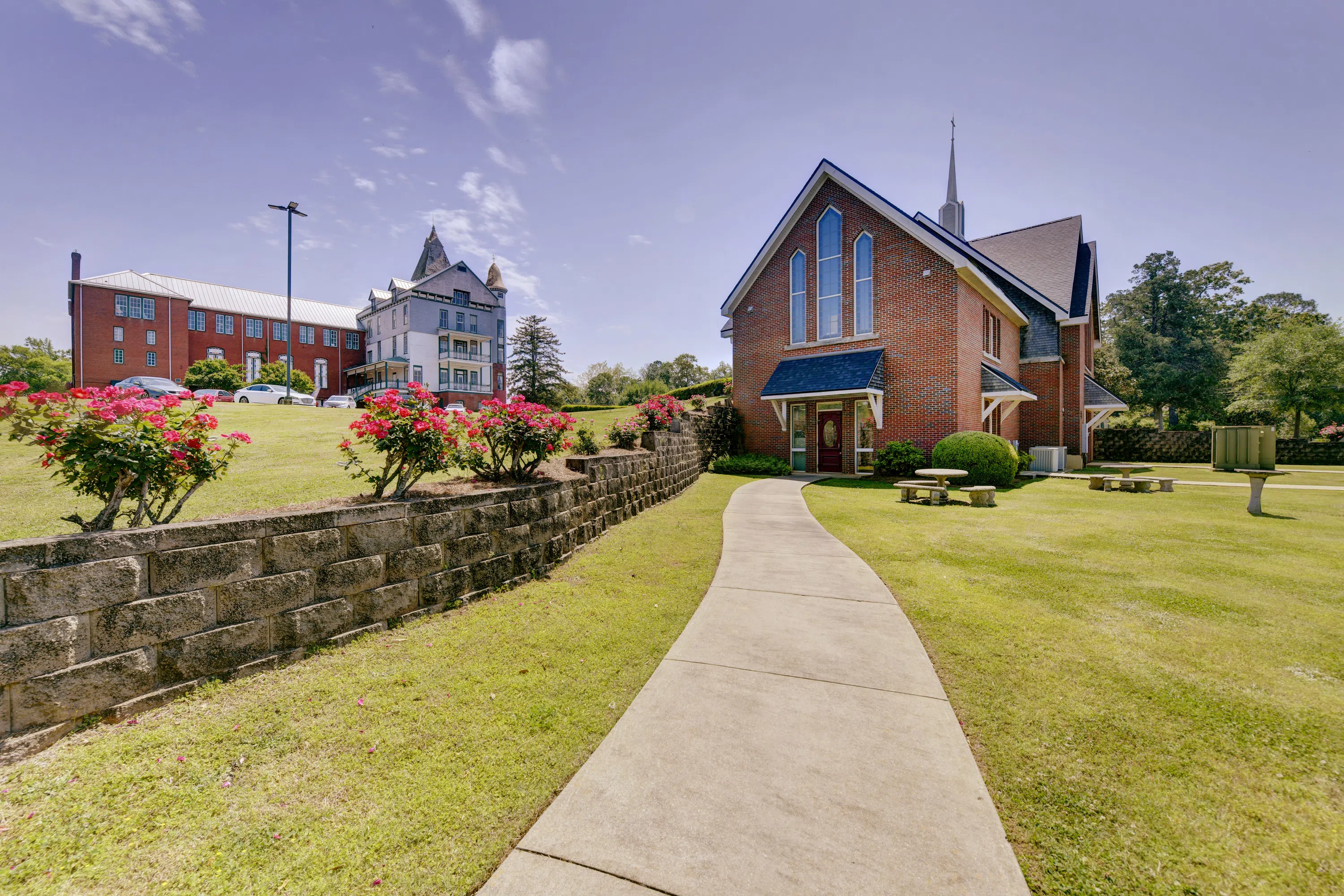 Outside image of the rear entrance to Jones Chapel with the Old Main building in the distance on the campus of Andrew College in Cuthbert, GA.