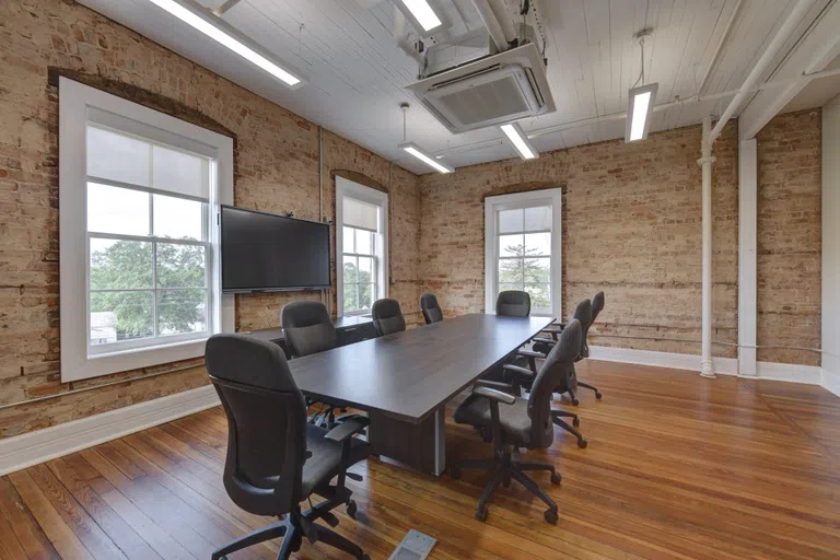 Photo of empty conference room with table and chairs located in Staples Hall on the campus of Andrew College in Cuthbert, GA.