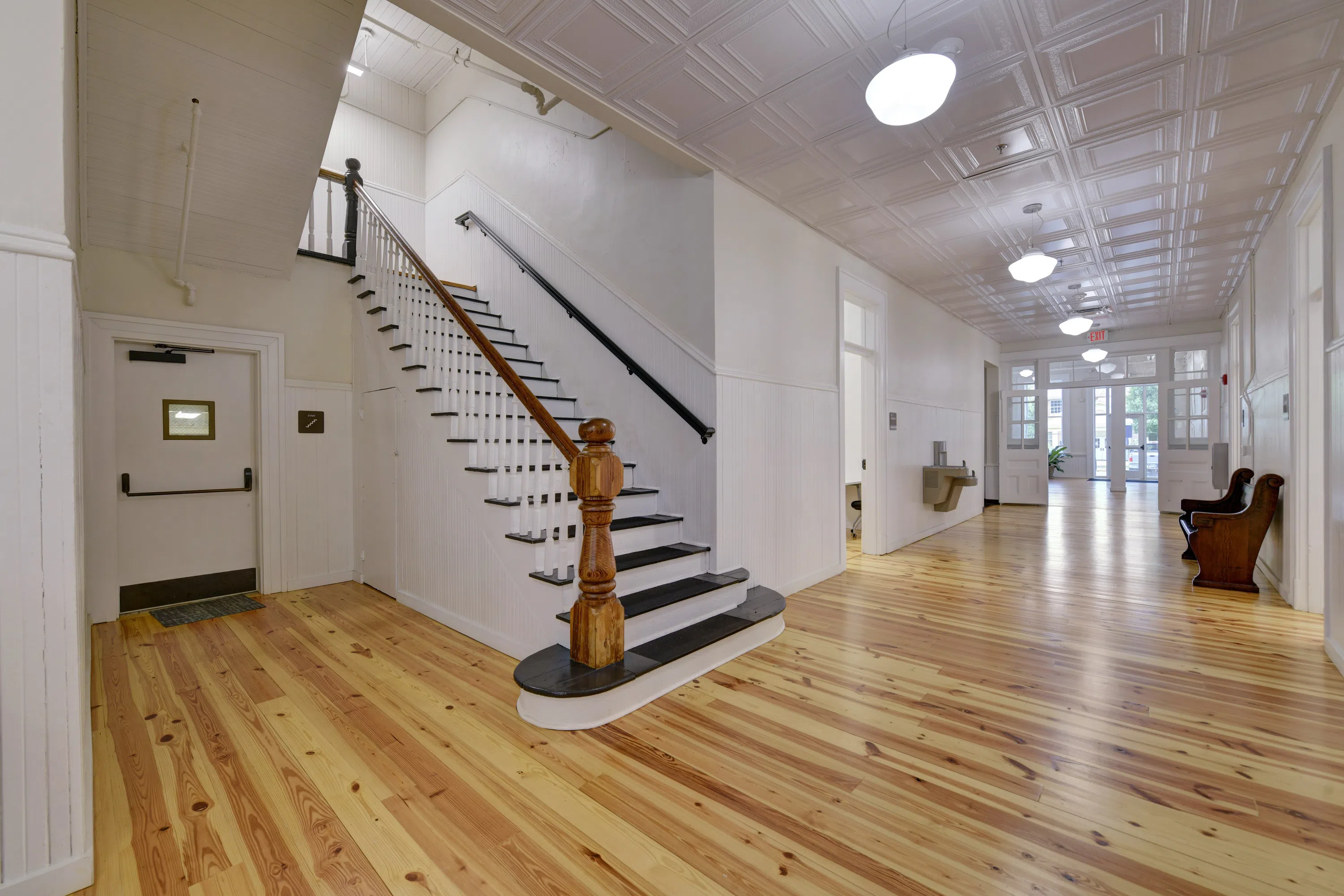 Photo of staircase and hallway located on the main floor of Staples Hall on the Andrew College campus in Cuthbert, GA.