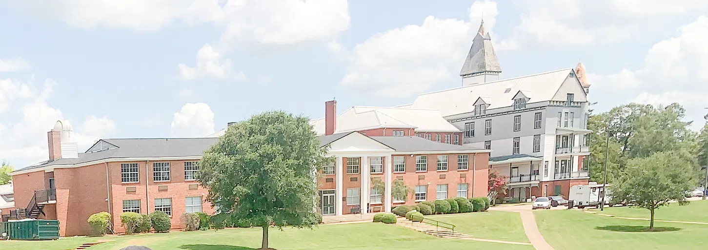 Exterior daytime photo of Rhodes Residence Hall.