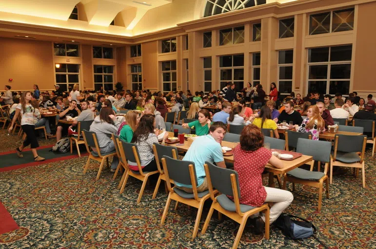 Students chowing down on another delicious dinner at the Commons