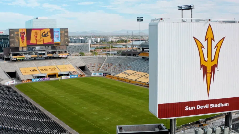 View of football field and jumbotron with images related to an upcoming game against UC Berkeley. 