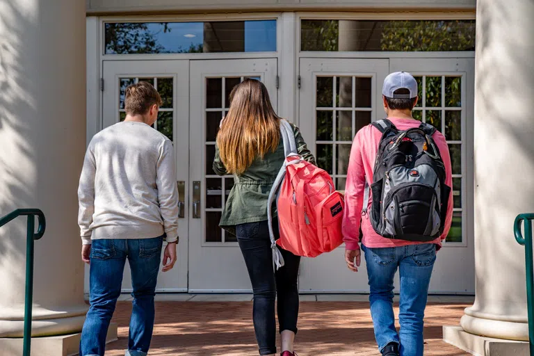 Students at the entrance of Roller Hall