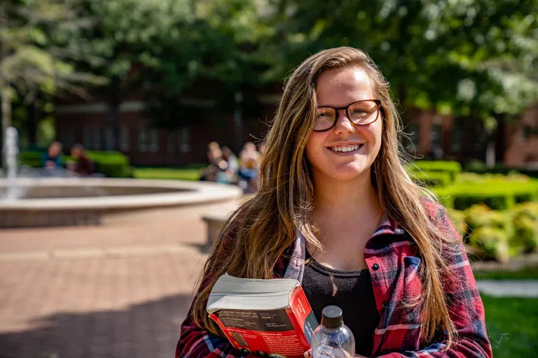 Student walking to Dryer Hall