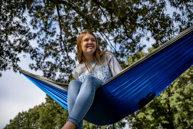 Image of student in hammock