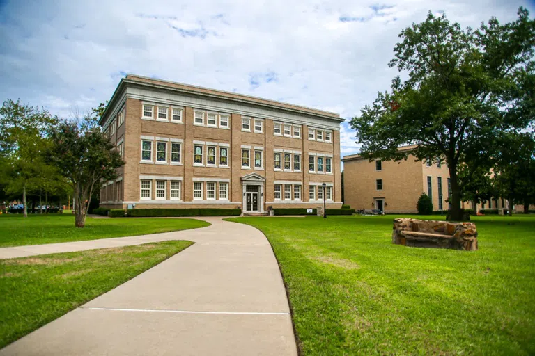 The citizens of Sherman donated $50,000 for the construction of Sherman Hall, which began in 1914. The three-story building contains 17,520 square feet and housed the administrative offices, an auditorium, and a library. The stained glass windows on the second floor were dedicated to the memory of individuals who served as early trustees of the college.