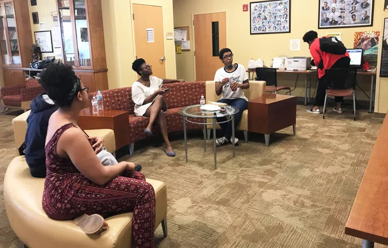 Interior of the BCC with Black/African American students in conversation