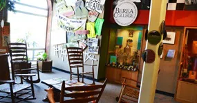 Rocking chairs sit invitingly in the space with Appalachian cultural artifacts.