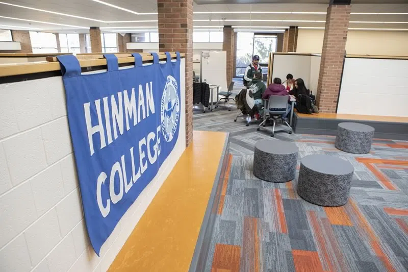 Study space in the Hinman Community with a "Hinman College" banner