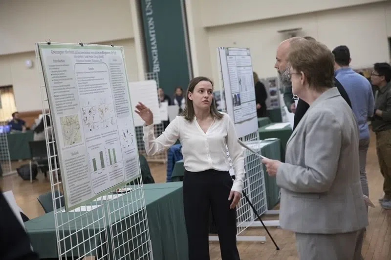 Students presenting research posters