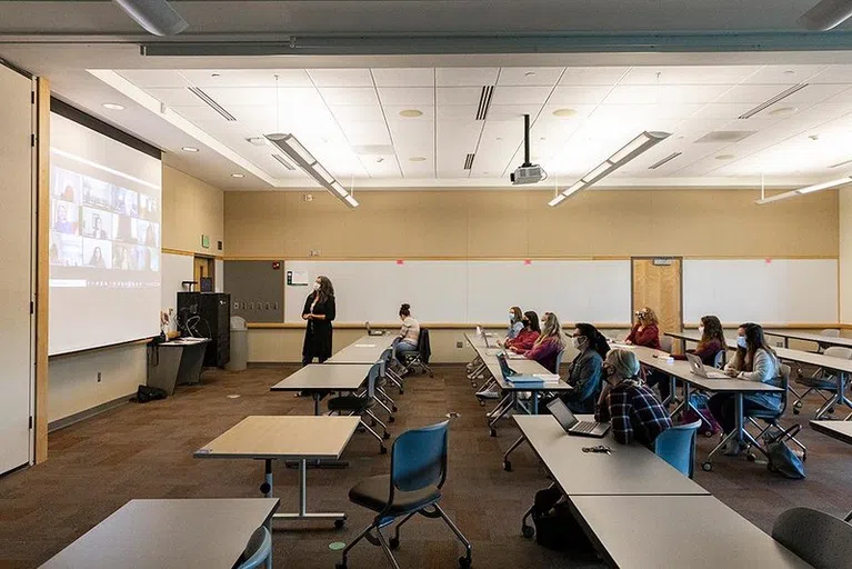 Lecturer Sophia Resciniti teaches Generalist Social Work Practice to a class at the University Downtown Center.