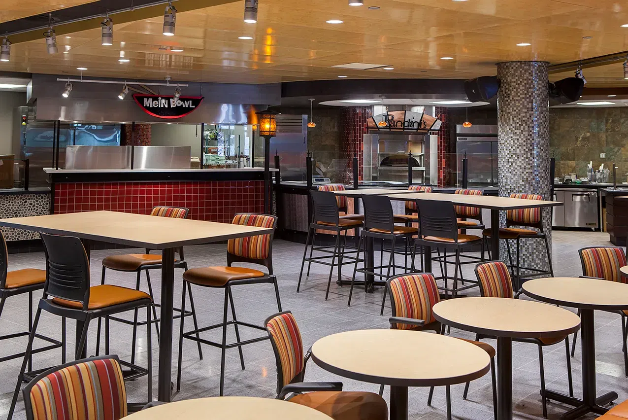 The MarketPlace features multiple food stations and study spaces for students.