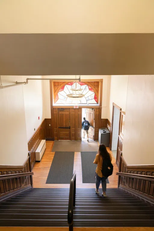 students walking down stairway