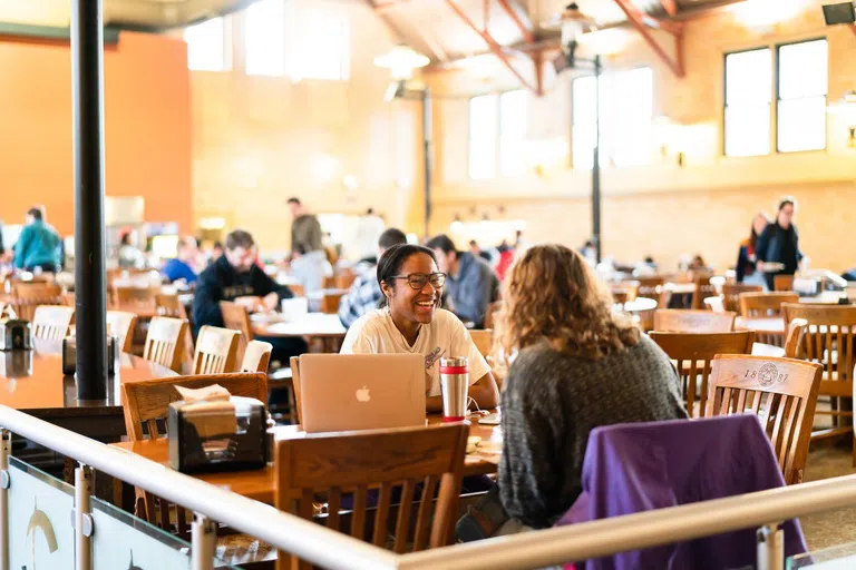 students eating in dining hall