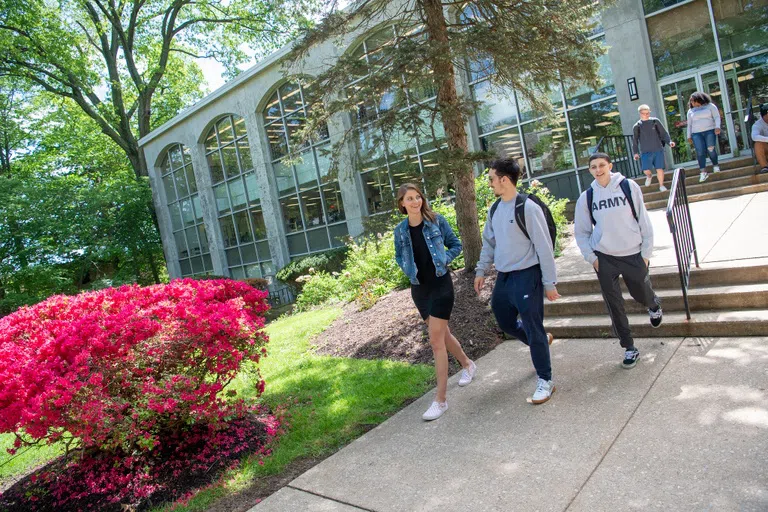 Students outside of the library