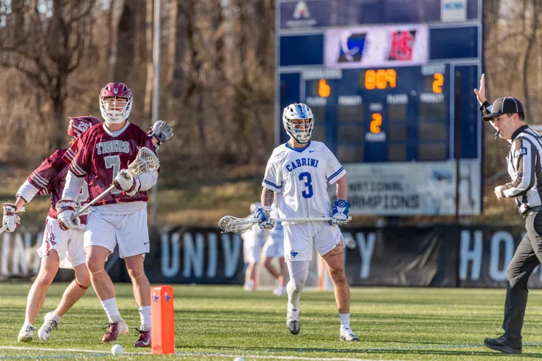 Men's Lacrosse on turf field 