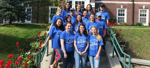 Students from Education and Professional Studies pose as a group