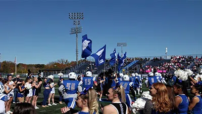 CCS mascot welcoming students