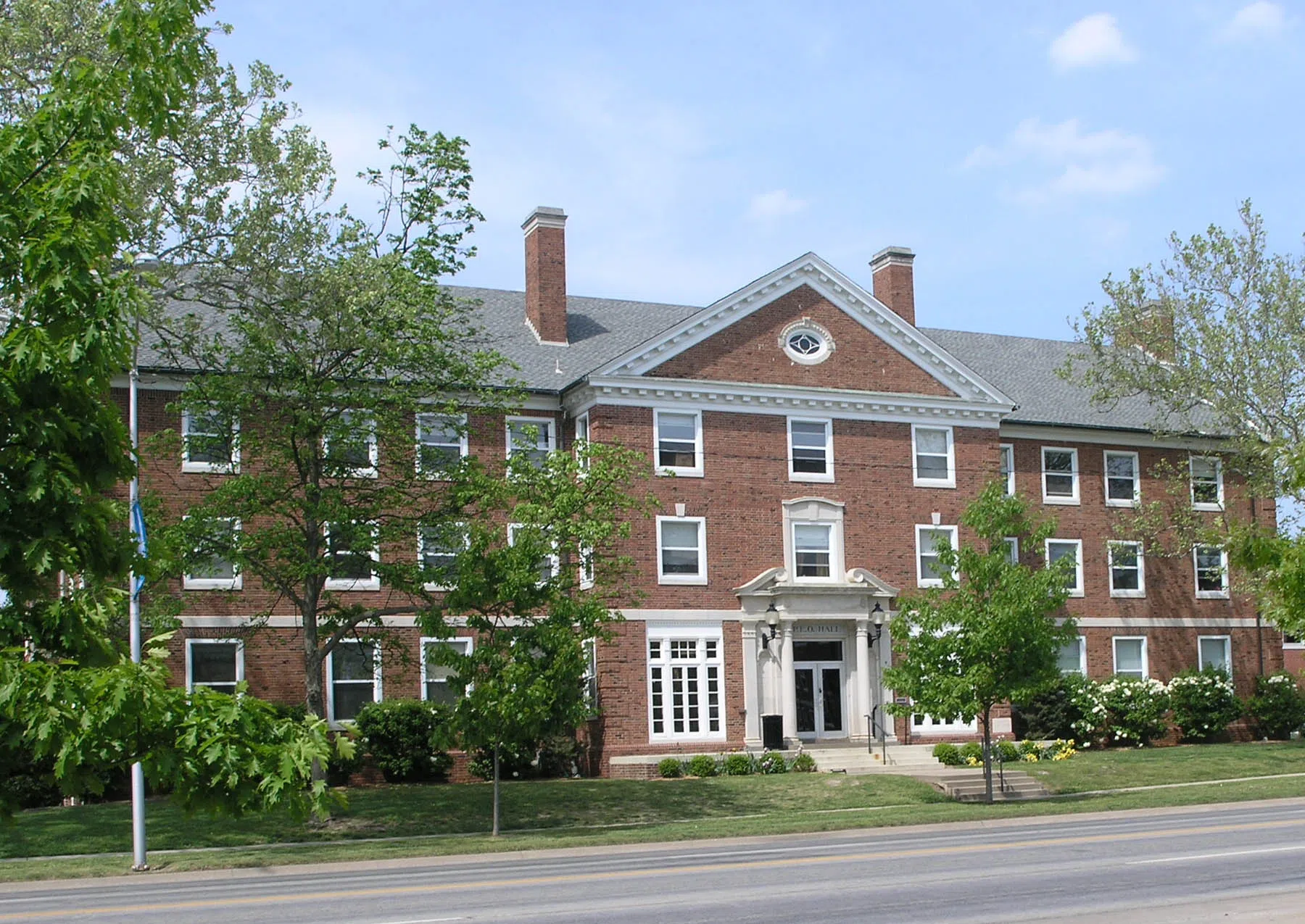 A stone entryway and flowers lining the steps make P.E.O. Hall a classic beauty