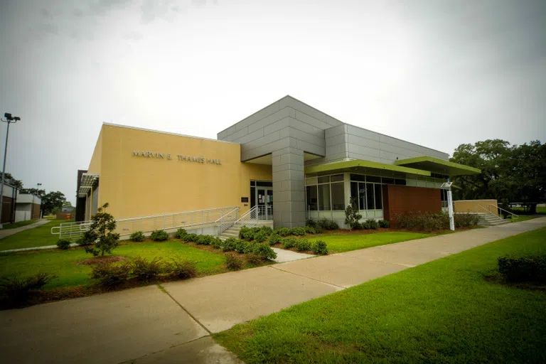 front of building with walkway and grass