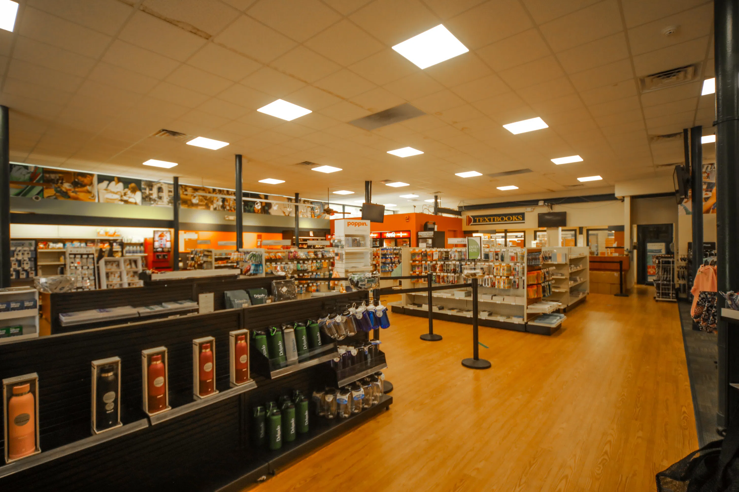 inside bookstore, multiple shelves of products