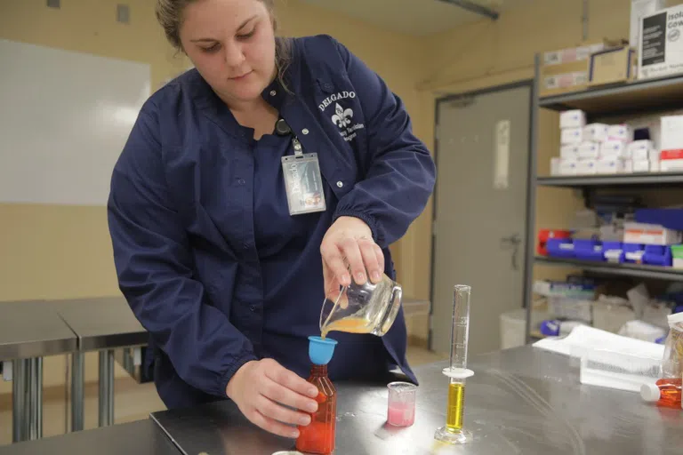 pharmacy student filling perscription