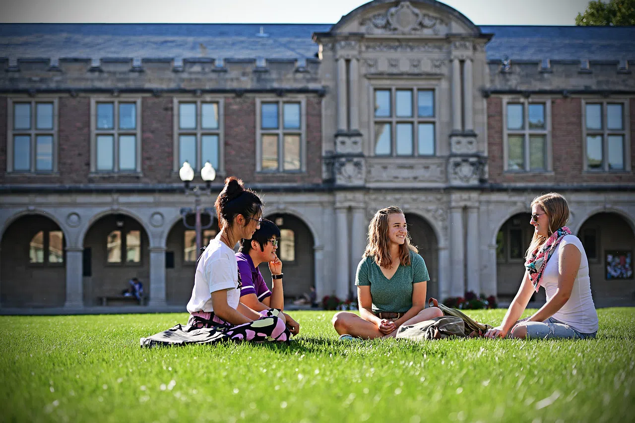 Students sit in the quad