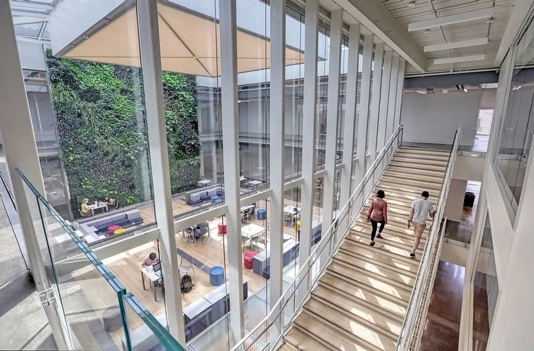 Overlooking the center court with the two-story living wall of plants