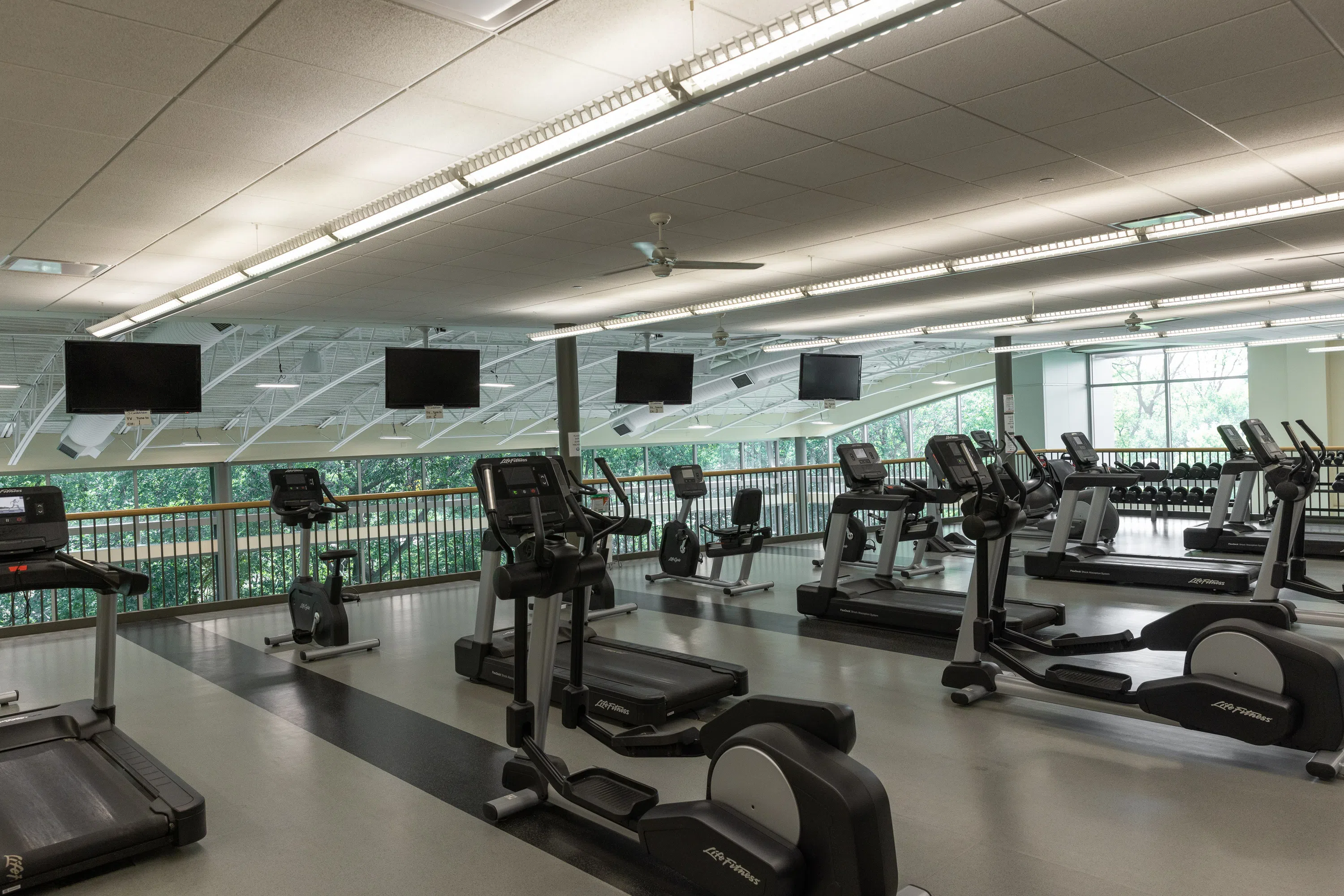 The cardio equipment overlooks the weight room