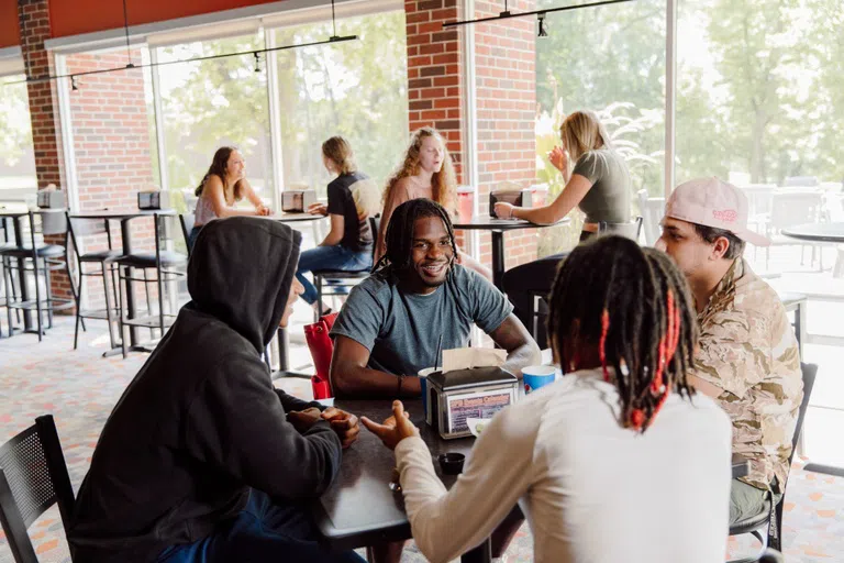 Students hang out by the coffee shop and grab 'n' go meal option between classes.