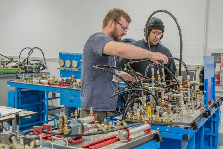 Students in the fluid power lab.