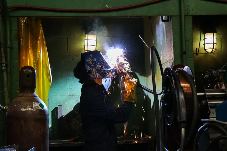 Welding student in ECTC welding lab.