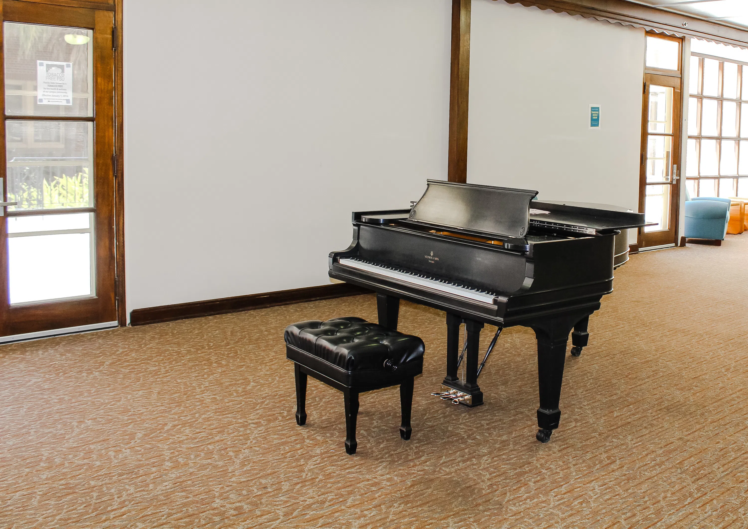A piano in Cawthon Hall's practice room