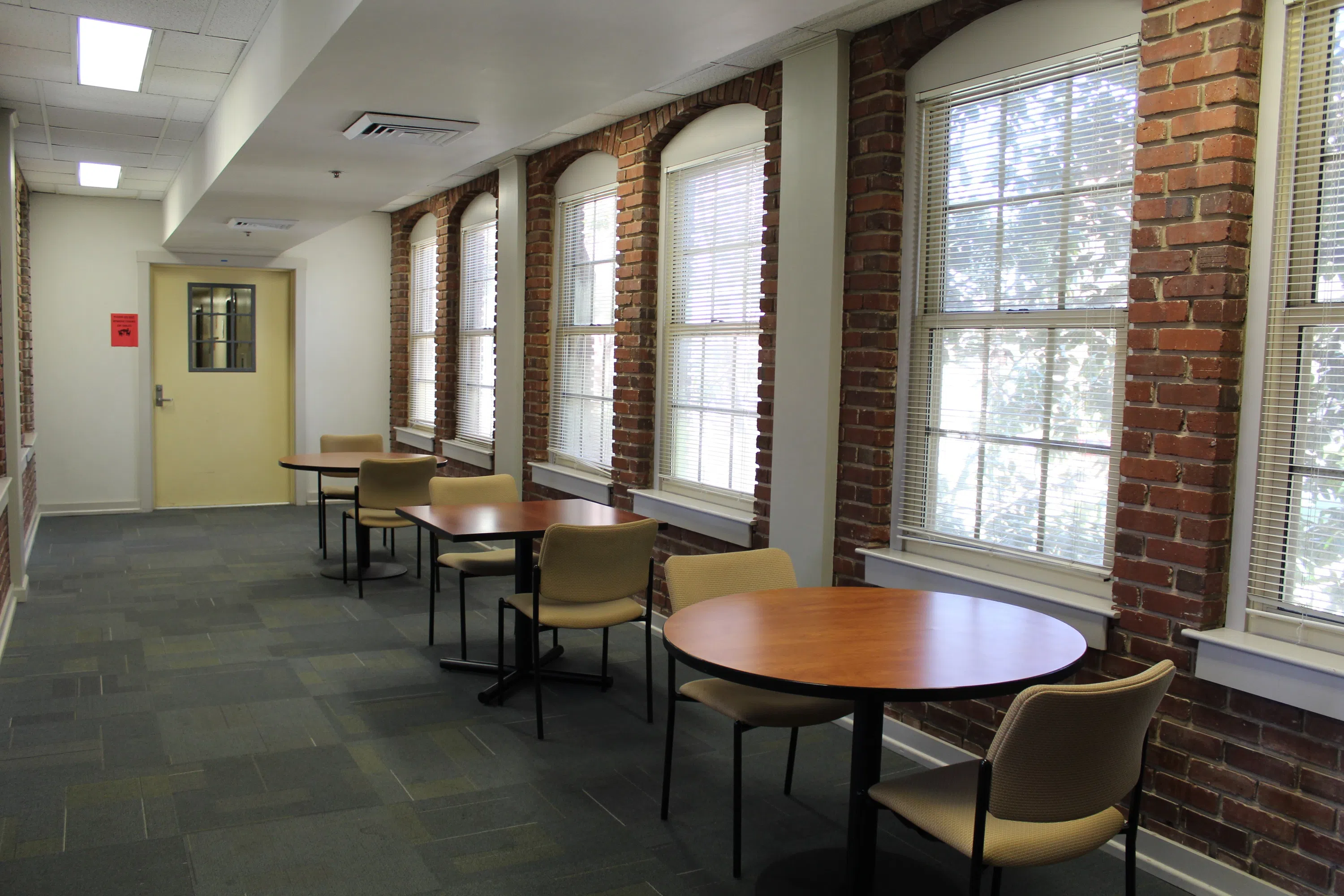 A study room with large windows