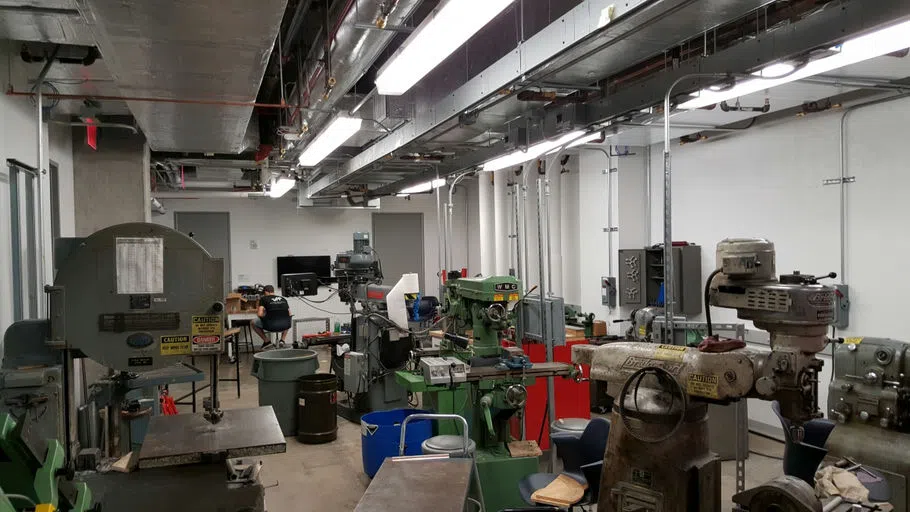 Photo of Student Machine shop with many forms of heavy equipment.