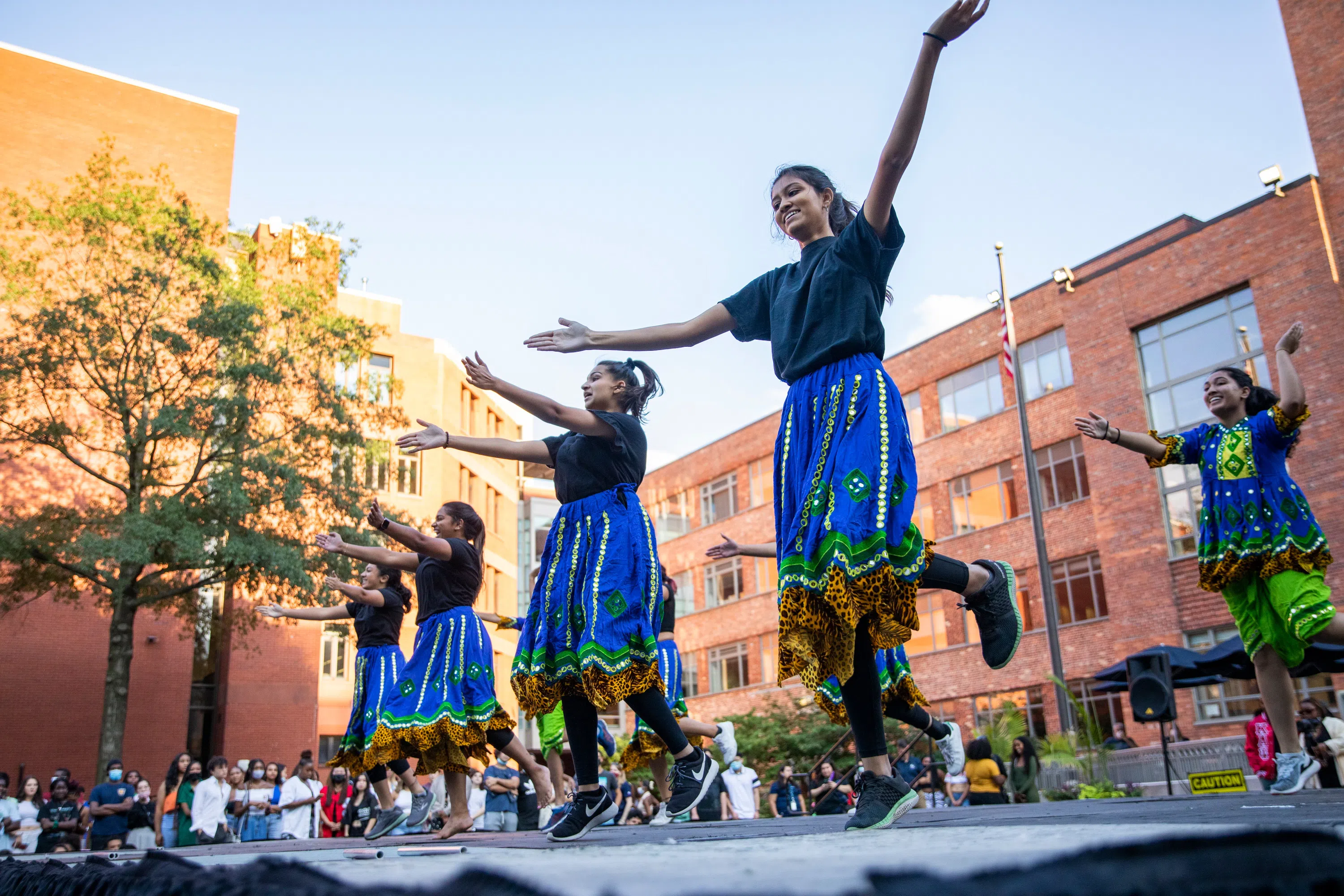 Students dancing at a block party