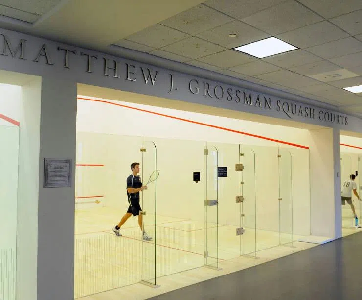 Image of exterior entrance to 1 of 3 squash and racquetball courts for student use on floor 3.