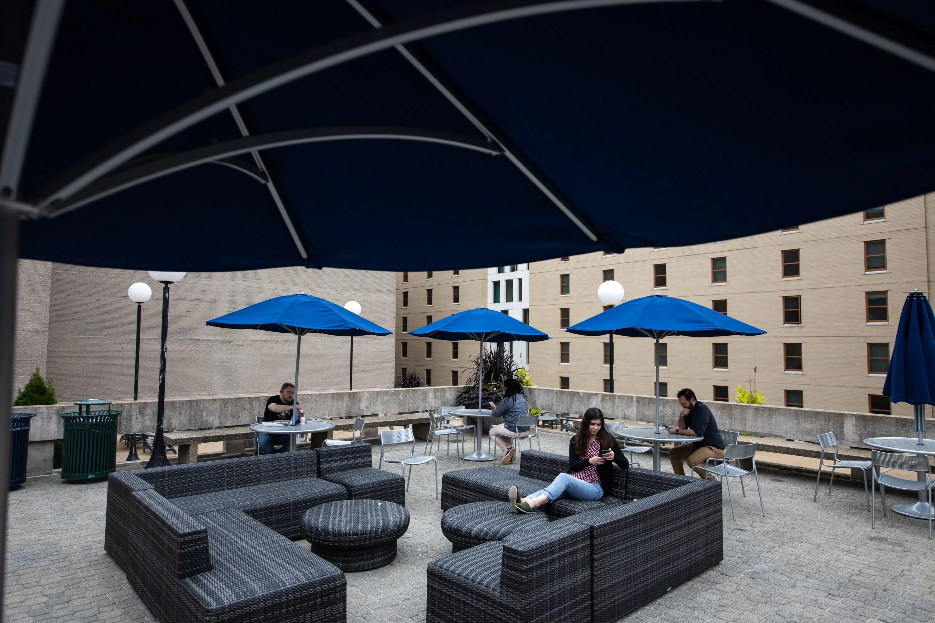 Students lounging on the rooftop patio of the University Student Center