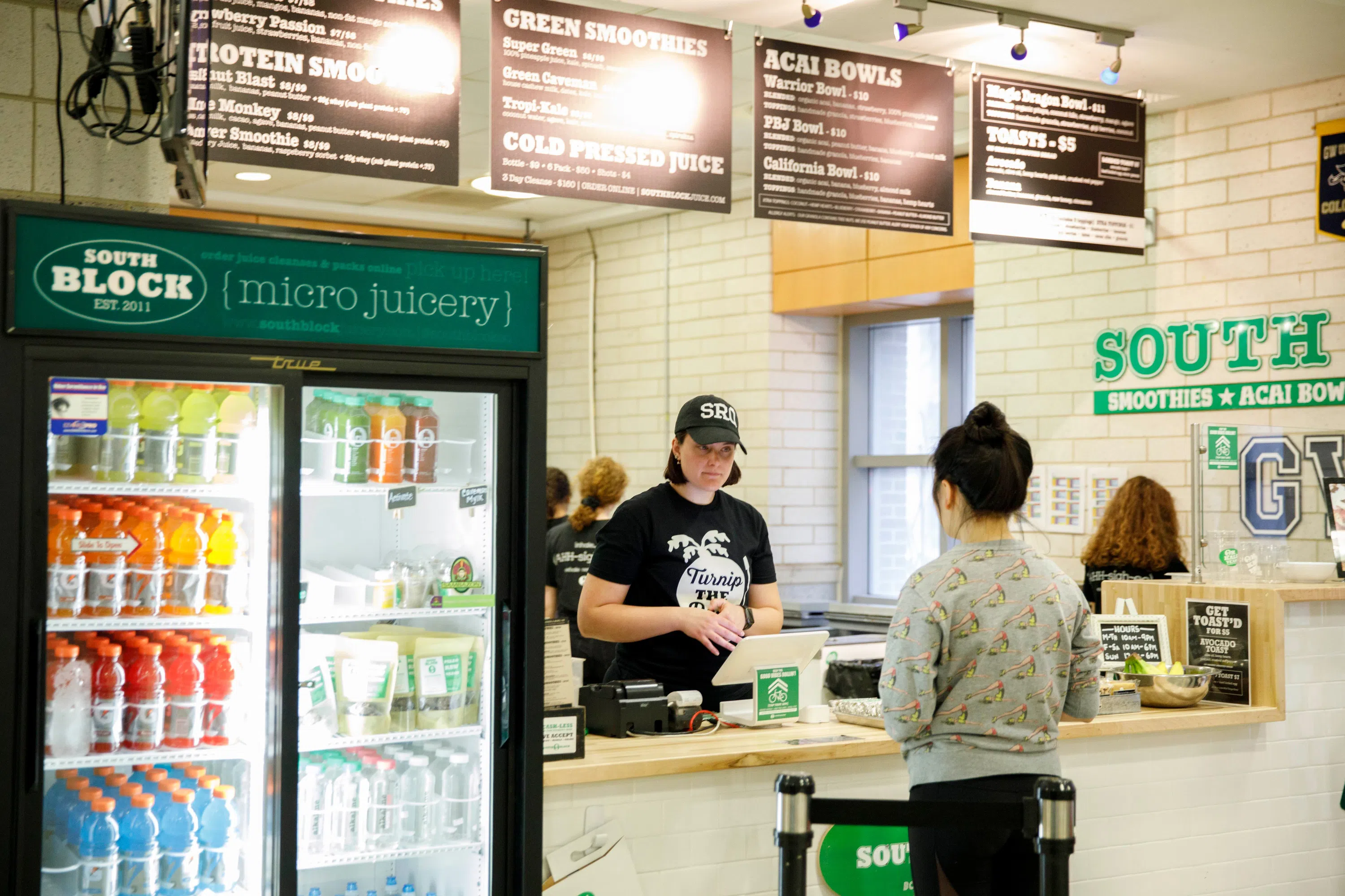 A student ordering a smoothie at South Block Juice Bar inside of the Lerner Health and Wellness Center