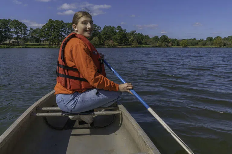 Student canoes on Paris Lake