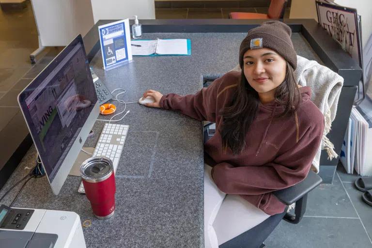 Student works the Help Desk