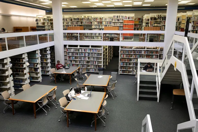 Students at a table in lower level